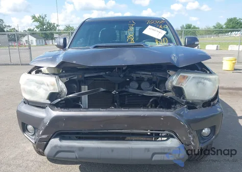 2012 Toyota Tacoma Base V6 z USA, uszkodzony, nr VIN 5TFUU4EN8CX027153
